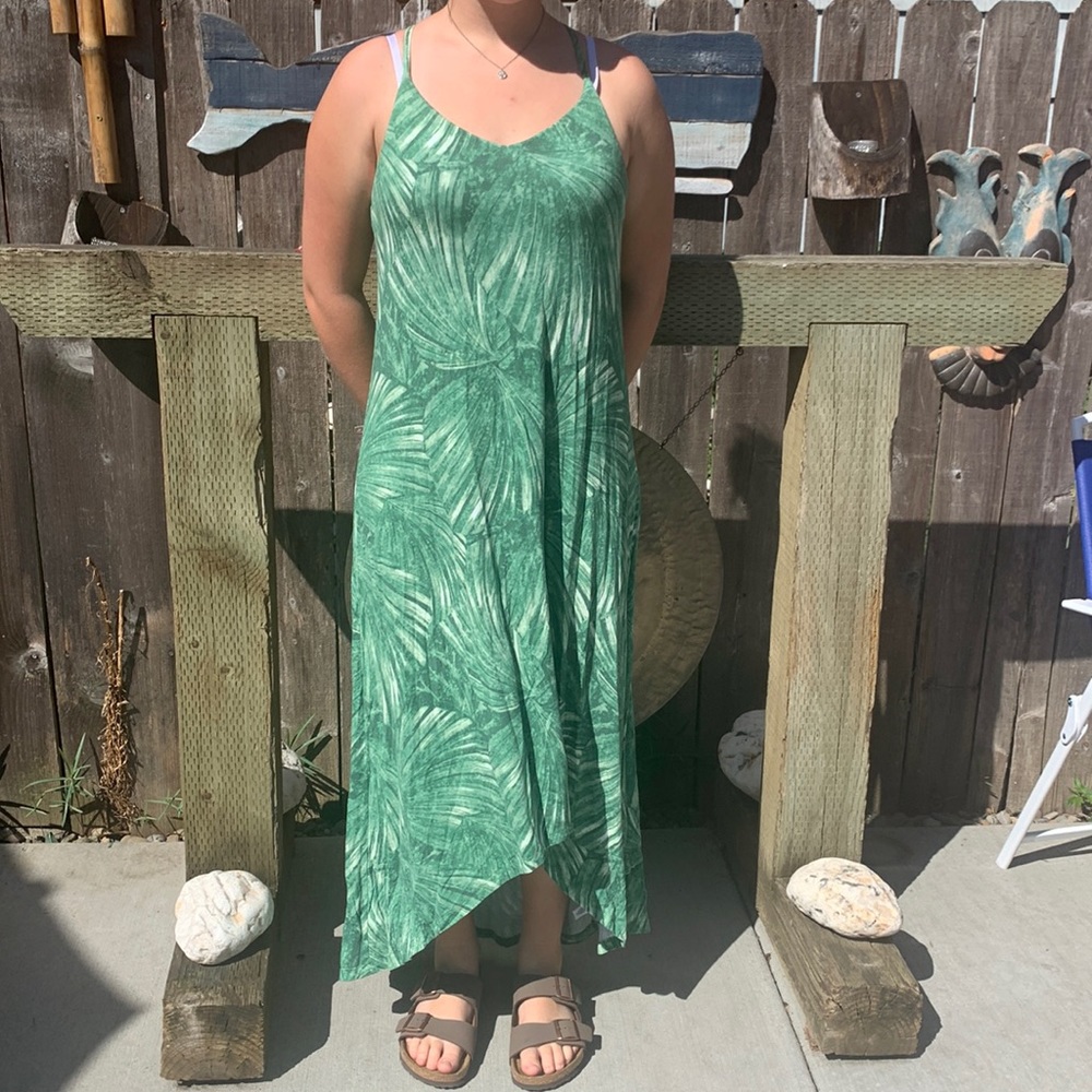 Can be worn as a dress or a swimsuit cover-up. Beautiful green floral pattern.